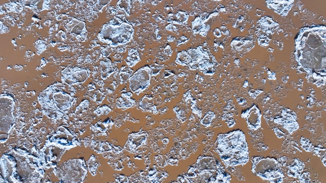 冬日奇观！落日流凌为黄河披上幻彩霓裳