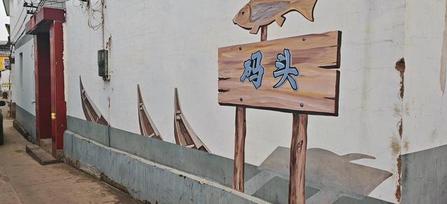 滇池边藏了个“小鼓浪屿”，白房子+彩虹桥+喂海鸥…朋友圈收割机