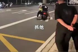 太炸裂！河南郑州鬼火少年飙车，当面挑衅，交警拦车被拖数十米！图片