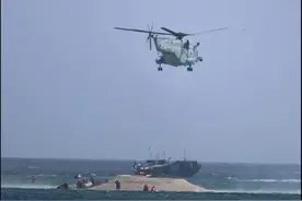 飞石砸了日本记者！菲方34人闯登铁线礁，中国直8直升机极速轰走图片