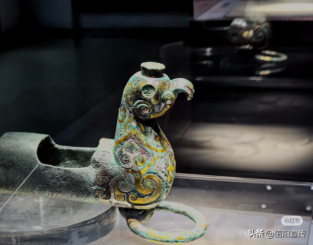 辞家千里，最念是信阳