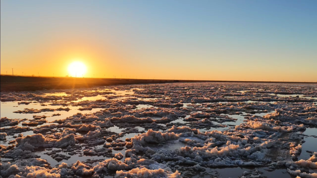 冬日奇观！落日流凌为黄河披上幻彩霓裳
