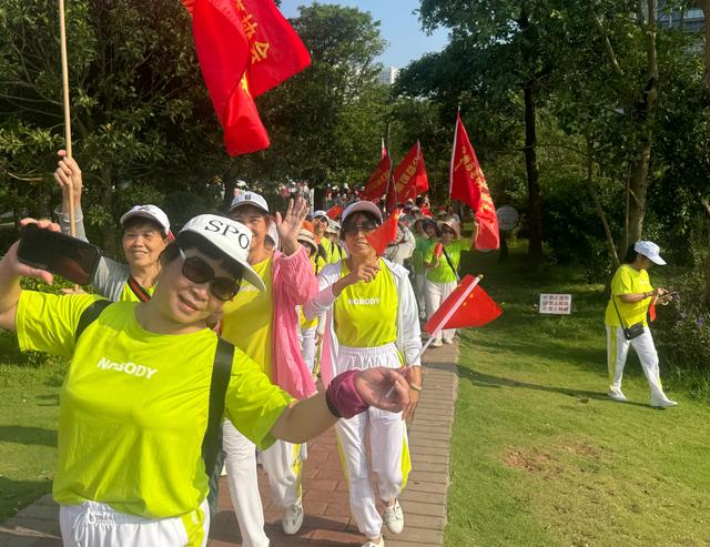 “中国体彩”走进乡村振兴示范点“百村千队万人”徒步在化州举行