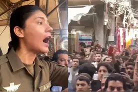 巴基斯坦一女子遭上百男子围攻，威胁要处以私刑，女警奋力保护图片