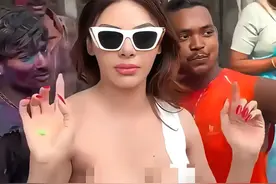 太吓人了、印度女星乔普拉穿着暴露，遭男粉丝围攻！大喊别碰我！图片