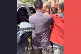 318国道孕妇逆行插队被打，后续：红衣男子赔了1万元，拘留10天图片