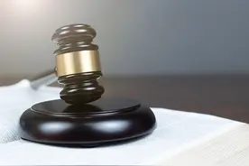 单位发放百万奖金要借账户一用？接过装满现金的行李箱后，两姐弟因洗钱获刑图片