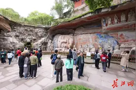 守护好中华文脉！100多人历时8年修复千手观音图片