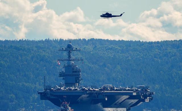 美航母压境委国海岸，普京紧急下令空投军援，拉美成大国角力战场