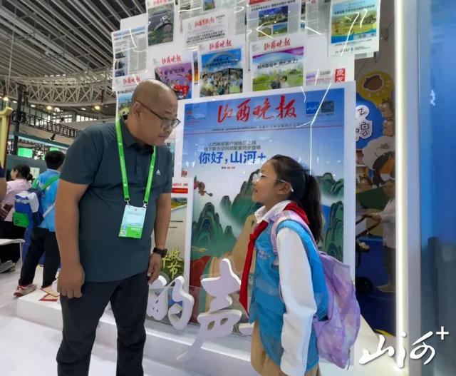 山西晚报小记者探访文博会：墨香里遇传统，智能中品三晋