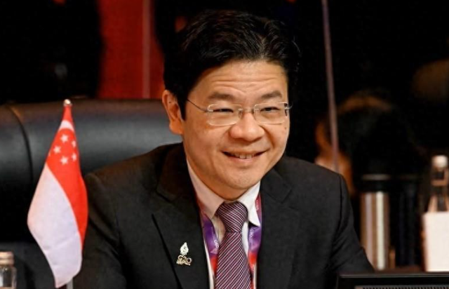 信号越来越明显！新加坡总理公开支持高市后，金龙鱼凉得更快了