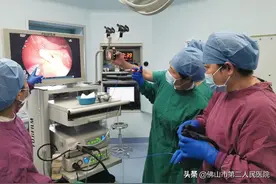 误吞牙签穿肠入肾，内镜巧取解危情图片