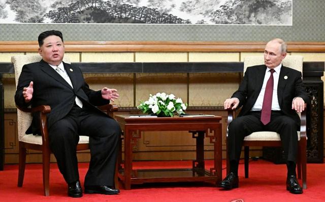 行程结束后同乘一辆车	，普京想听到的承诺，金正恩在北京当面给了