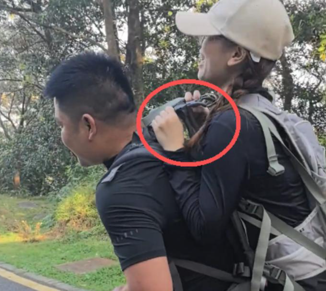 广东女子登山脚崴，被陌生小伙背40分钟下山，恶心的一幕却出现了