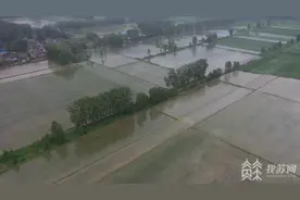 梅雨带北抬 江苏北部和南部现“水火两重天”图片