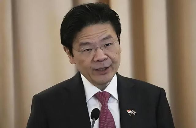 新加坡总理公开支持高市后，被罚18亿账单的金龙鱼，凉得更快了