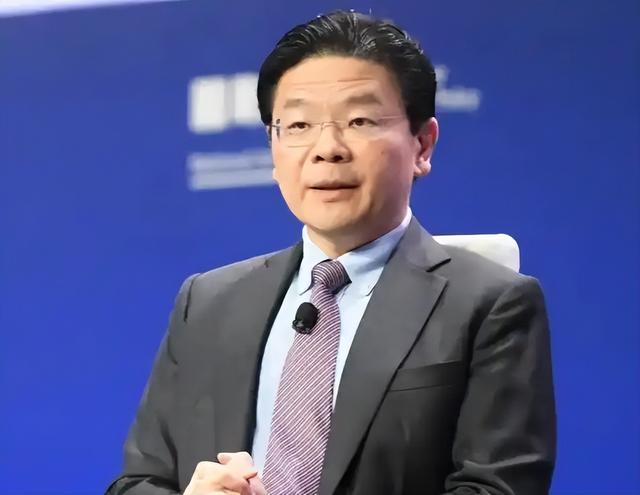 新加坡总理公开支持高市后，被罚18亿账单的金龙鱼	，凉得更快了