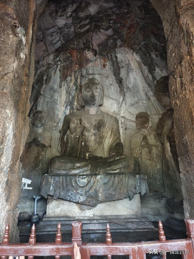 雨中游览“中国三大佛教石窟艺术宝库”之一的洛阳龙门石窟（上）