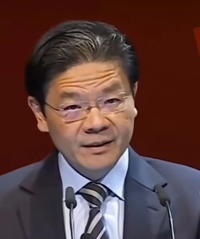 新加坡总理公开支持高市后	，被罚18亿账单的金龙鱼，凉得更快了