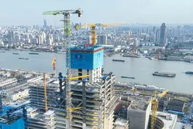 杨浦首个！由“空中造楼机”建造的百米高楼，核心筒封顶！图片