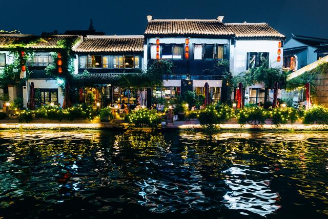 桨声灯影古运河，千年驿道焕新颜：夜泊南长记