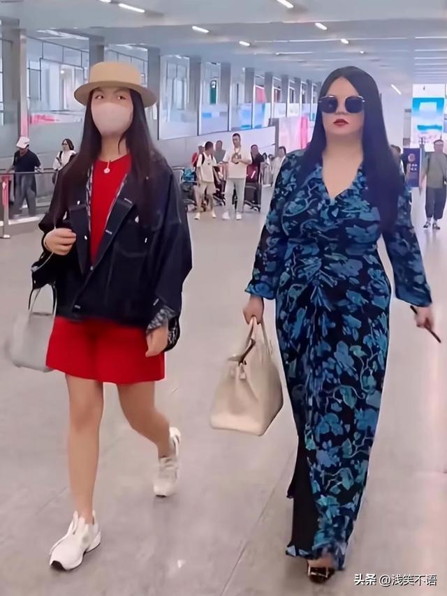 200斤的李湘机场现身！气场全开，颤抖的肥肉也挡不住土豪范儿！