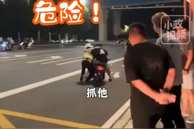 危险！河南郑州鬼火少年飙车炫技，当面挑衅 交警拦车被拖行数十米图片