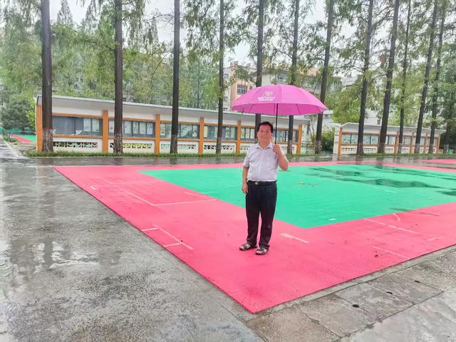 雨中游汝南和母校（作者：朱树理）