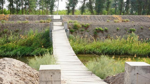 魂牵梦萦 阿拉尔八团加工连那座吊桥