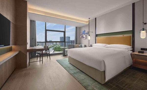 旅游媒体｜郑州东区希尔顿逸林酒店开业｜广州旅游媒体