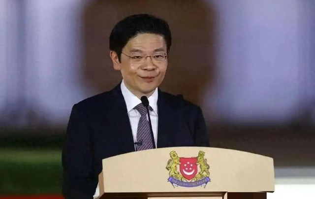 新加坡总理公开支持高市后	，被罚18亿账单的金龙鱼，凉得更快了
