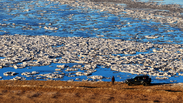 冬日奇观！落日流凌为黄河披上幻彩霓裳