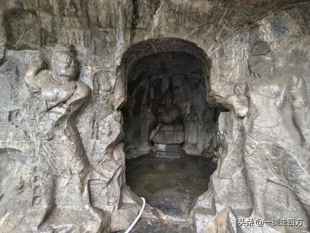 雨中游览“中国三大佛教石窟艺术宝库”之一的洛阳龙门石窟（上）
