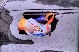 图省事！男子18楼扔垃圾，无辜邻居轿车被砸出大窟窿→图片