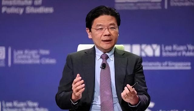 新加坡总理公开支持高市后	，被罚18亿账单的金龙鱼，凉得更快了