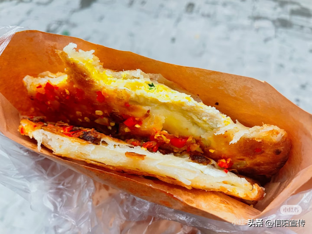 辞家千里，最念是信阳