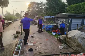 服务东博会和峰会进行时｜取缔“马路市场”，恢复道路整洁畅通图片
