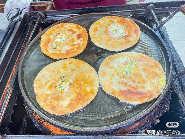 辞家千里，最念是信阳