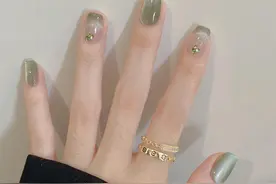 绿色清凉猫眼美甲图片