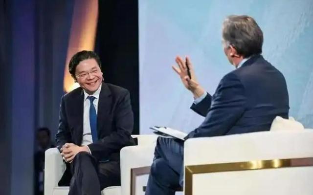 新加坡总理公开支持高市后，被罚18亿账单的金龙鱼	，凉得更快了