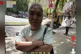 网友拍摄城管执法遭“人上人”驱赶：谁叫你录的？你没权利。图片