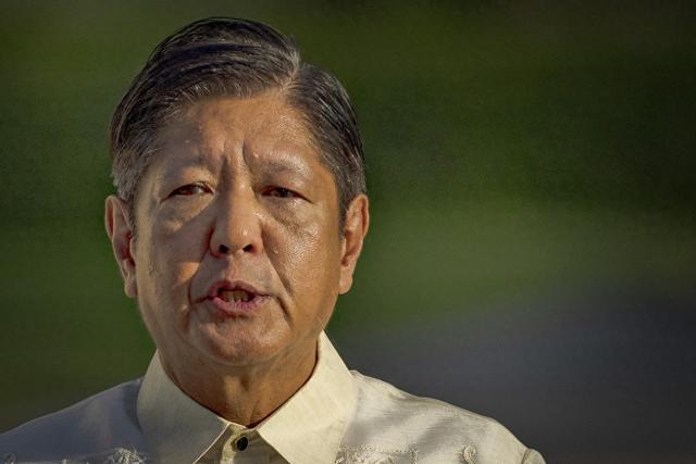马科斯访美为何不穿传统服装穿西装