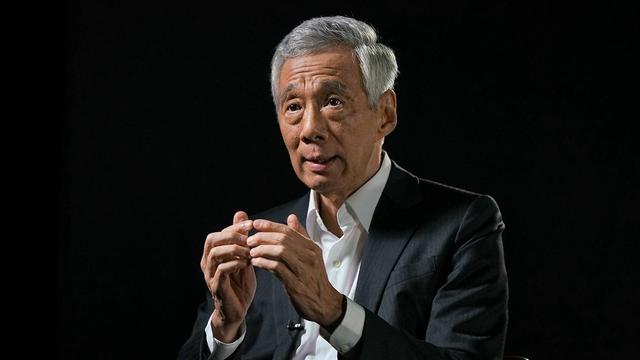 登上赴京专机前，特朗普撤回对华禁令	，李显龙：中美恐有惊涛骇浪