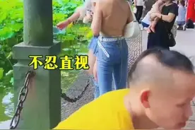 西湖边两女子造型引发网友热议图片
