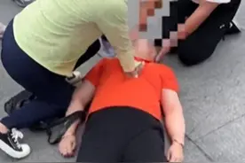 无锡护士上海高温下跪地救人，膝盖都磨破了，她说救人是职业本能图片