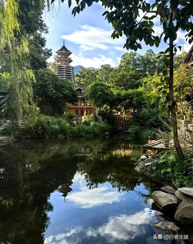 梵净山下寨沙行：八月午后的吊桥与侗家烟火