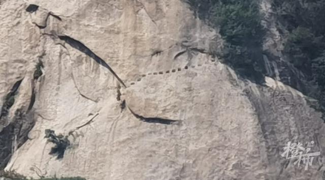 华山险峰发现神秘洞窟和汉代塑像？ 景区回应橙柿：相关地点已管控，不建议大家打卡