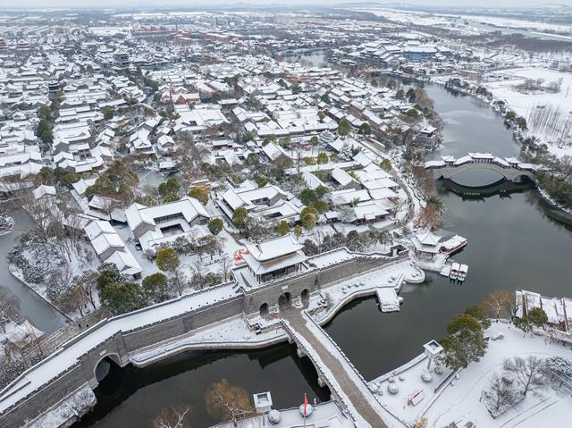 想把台儿庄古城的雪寄给你！