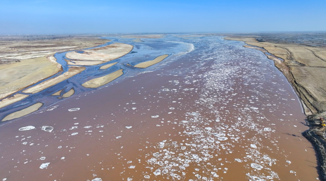 冬日奇观！落日流凌为黄河披上幻彩霓裳