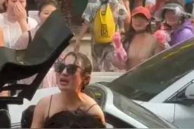 美女西双版纳开敞篷跑车，敞篷进水关不上直接发飙，成泡水车了图片